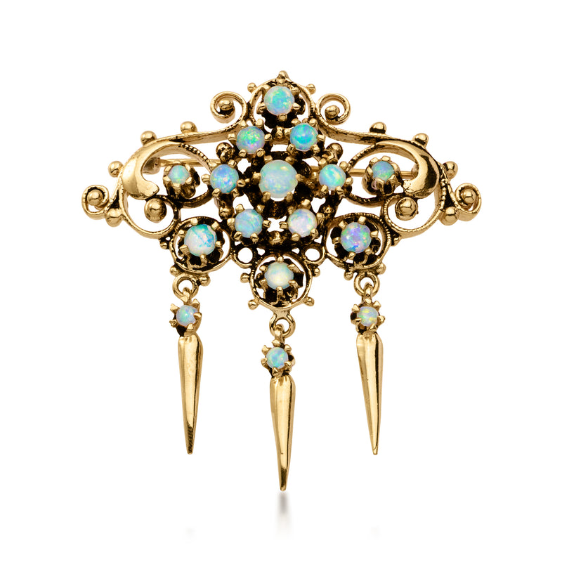 Ornate 14kt yellow gold brooch with opal-like blue stones and three dangling drops