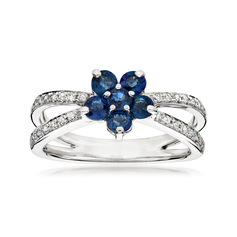Vintage sapphire flower ring in 14kt white gold with diamond accents