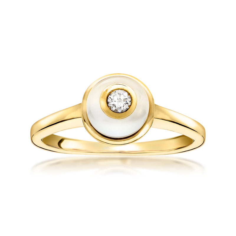 Gold ring with round white pearl bezel and small diamond solitaire center