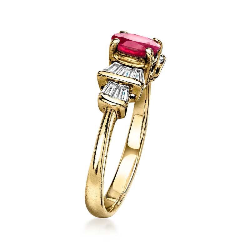 Yellow gold ring with raised oval ruby and stacked baguette diamond bands