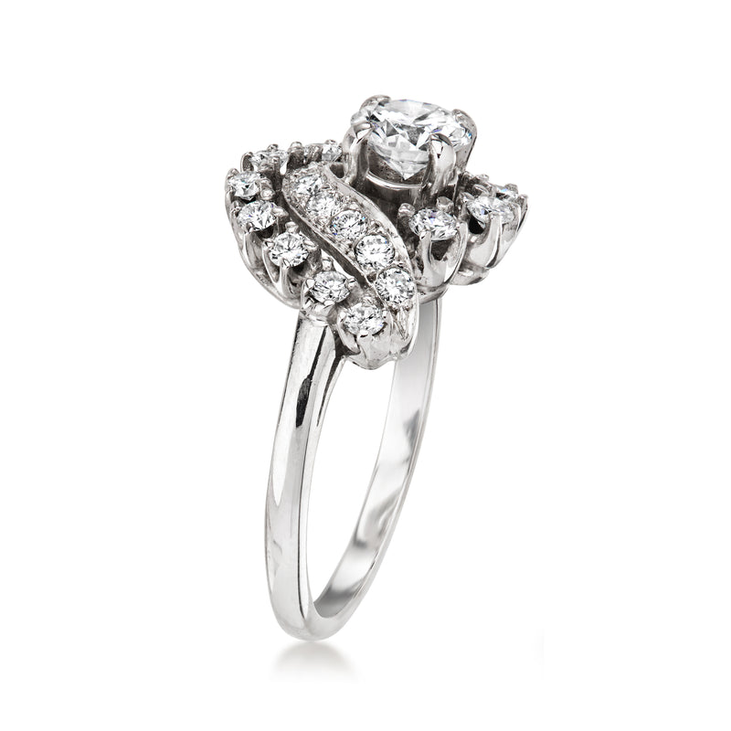 Diamond swirl halo ring, round center stone in white gold setting