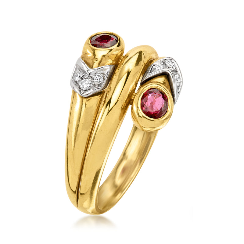 Yellow gold bypass ring with two round pink rubies and small diamond-set details