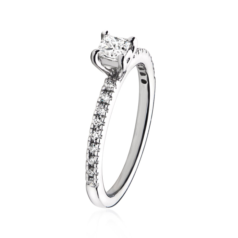 Vintage 14kt white gold diamond ring with princess-cut center and pavé band