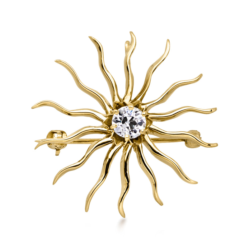 Vintage sunburst diamond pin in 10kt yellow gold with faceted round center stone