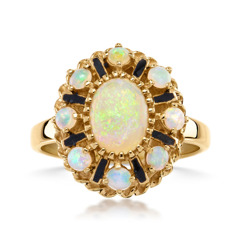 14kt yellow gold vintage opal ring with black enamel and halo of opal-like stones