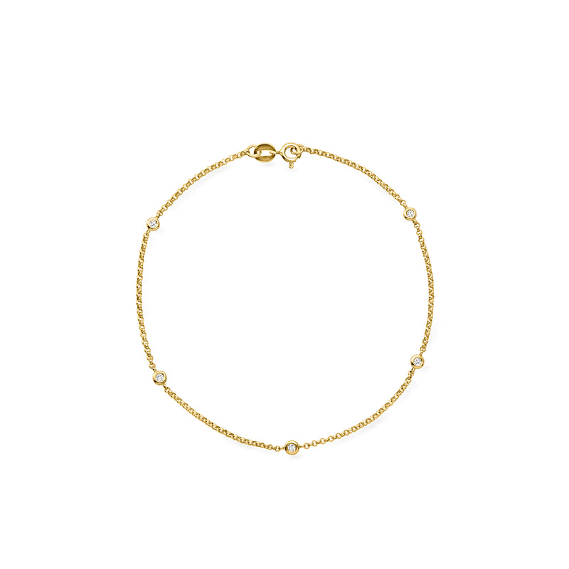 14kt yellow gold diamond station anklet with small round stones and clasp