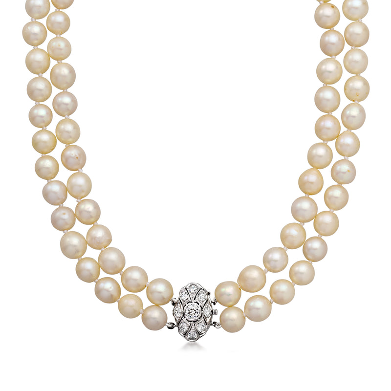 Two-strand cultured pearl necklace with diamond-set clasp in white gold