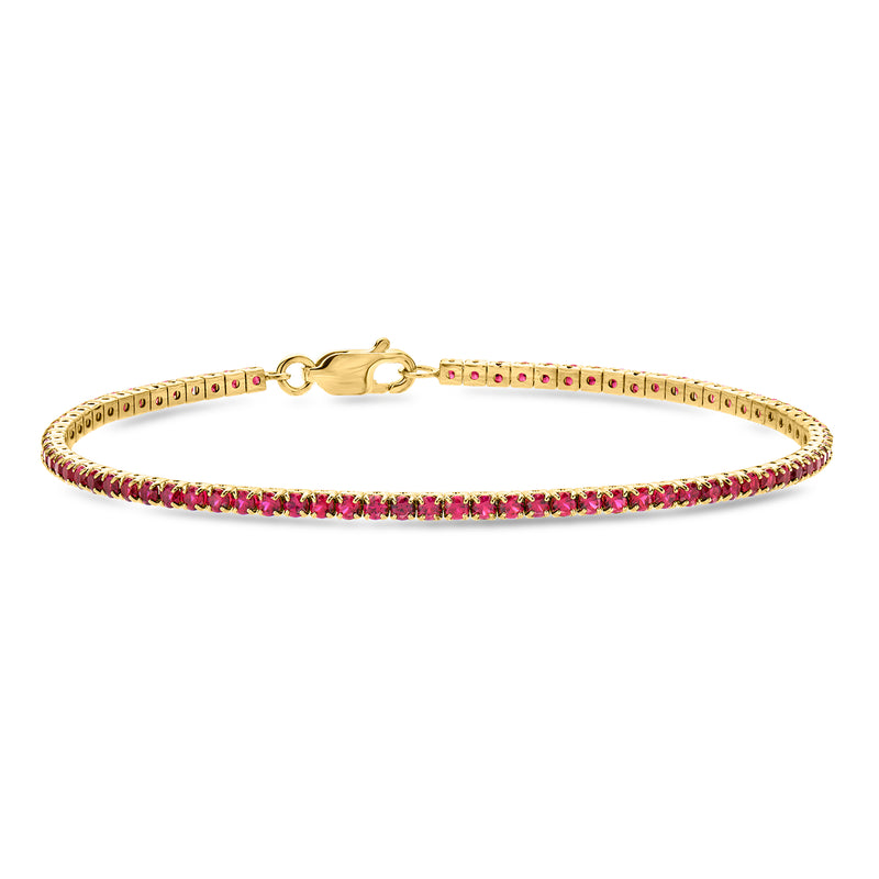 Gold over sterling tennis bracelet with red lab-grown ruby stones and clasp