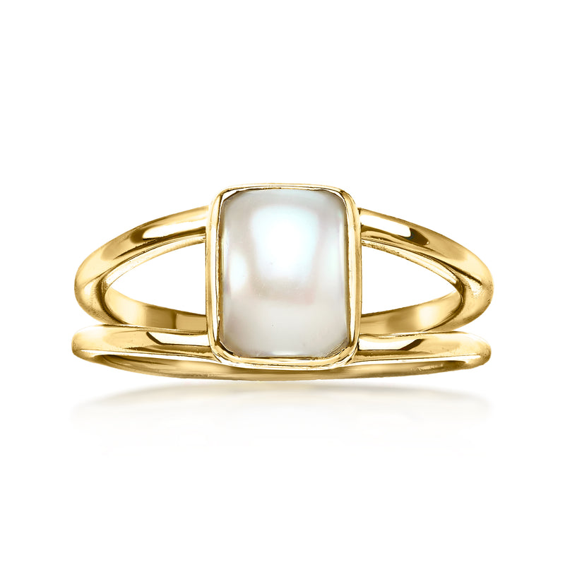 Gold-tone open-space ring with square white pearl-like center, polished band