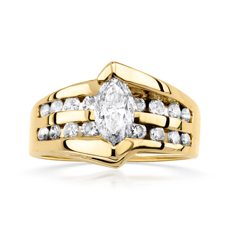 Vintage diamond ring in 14kt yellow gold with a large marquise center stone