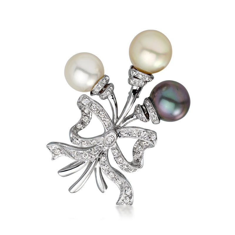 Vintage pearl bow pin with diamonds in white gold and three cultured pearls