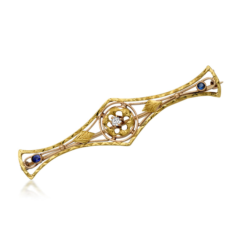 Yellow gold floral bar pin with round diamond center and blue simulated sapphire accents