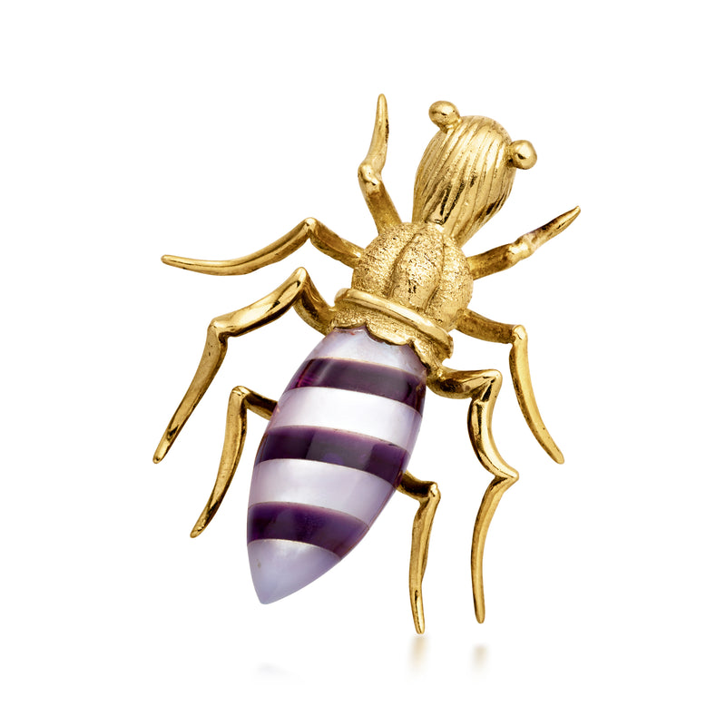 Gold insect brooch pin with purple striped oval body and raised antenna legs