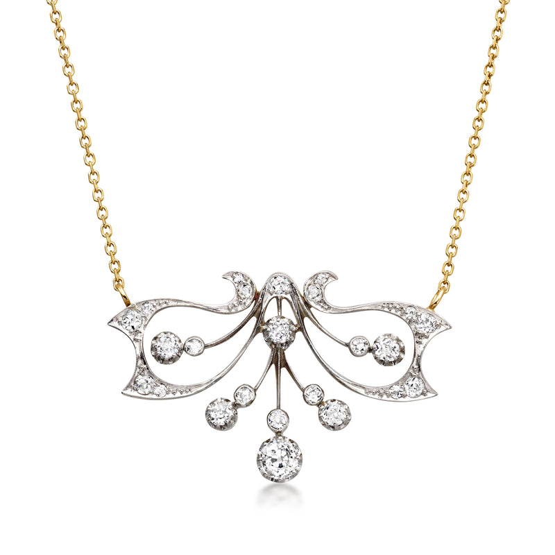 Yellow gold chain diamond floral bow necklace with teardrop center and round accents