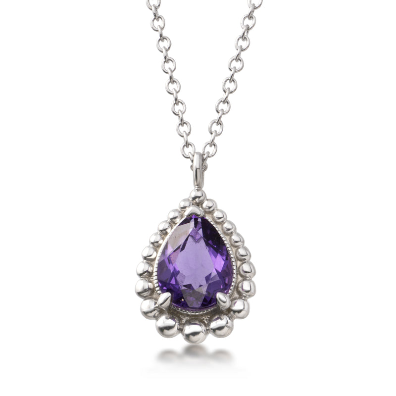 Sterling silver pendant necklace with teardrop amethyst stone and beaded-edge setting
