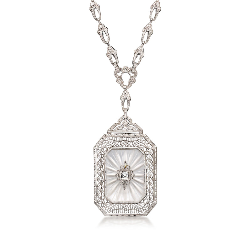 Vintage rock crystal pendant necklace in white gold with central diamond detail