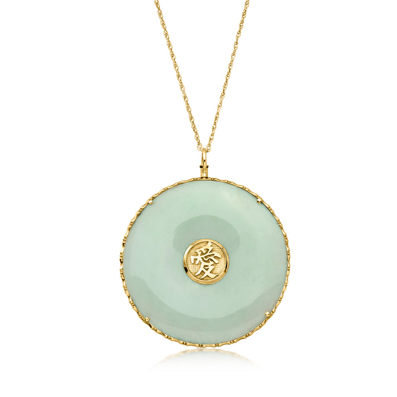14kt yellow gold jade pendant necklace featuring round light jade disc and gold character charm