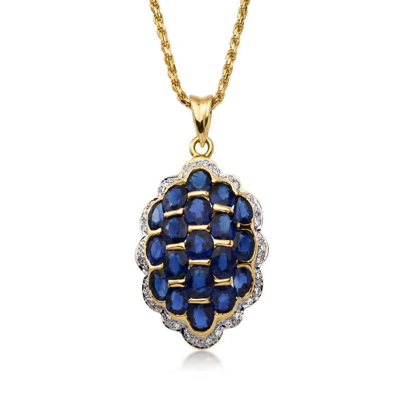 Gold pendant necklace with scalloped blue sapphire cluster and diamond halo
