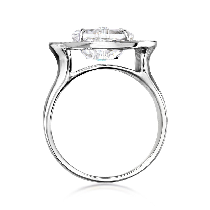 Vintage white gold ring top view with prong-set center stone and slim band