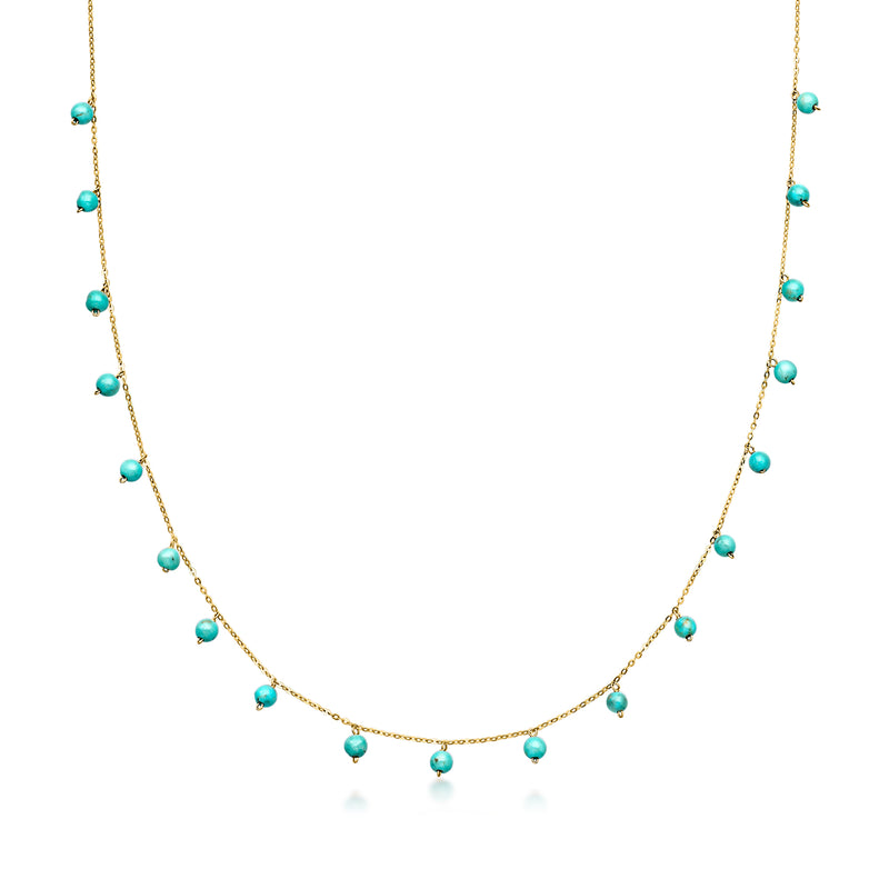 10kt yellow gold bead station necklace with turquoise beads on a delicate chain