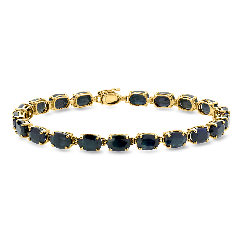 Vintage yellow-gold bracelet with oval dark blue stones