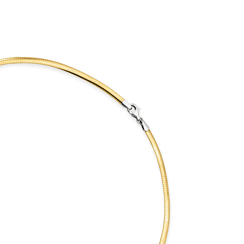 Yellow gold omega necklace clasp with thin round chain and end links visible