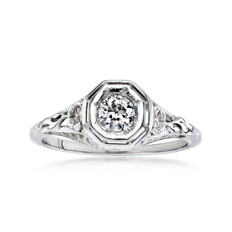 Vintage diamond filigree ring in white gold with round center stone