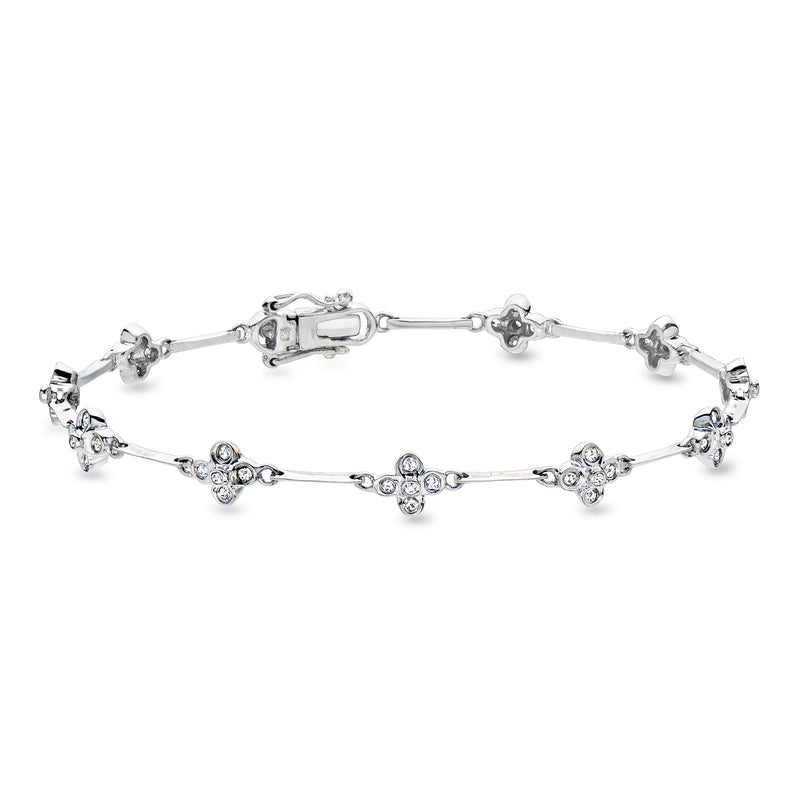 Vintage 14kt white gold diamond flower station bracelet with small round stones