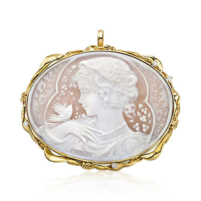 Oval cameo pin/pendant in 18kt yellow gold with white shell portrait and diamond accents