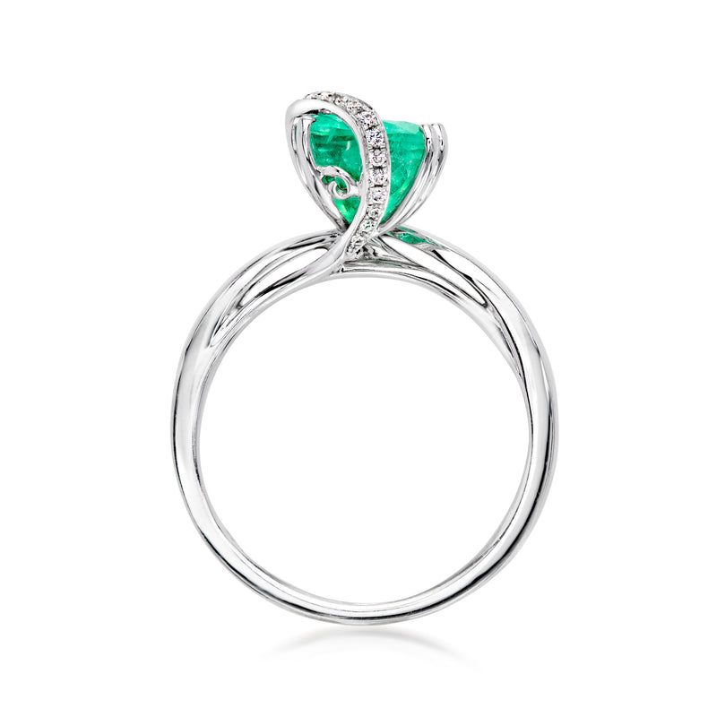 Vintage emerald ring with diamond accents in white gold, side view