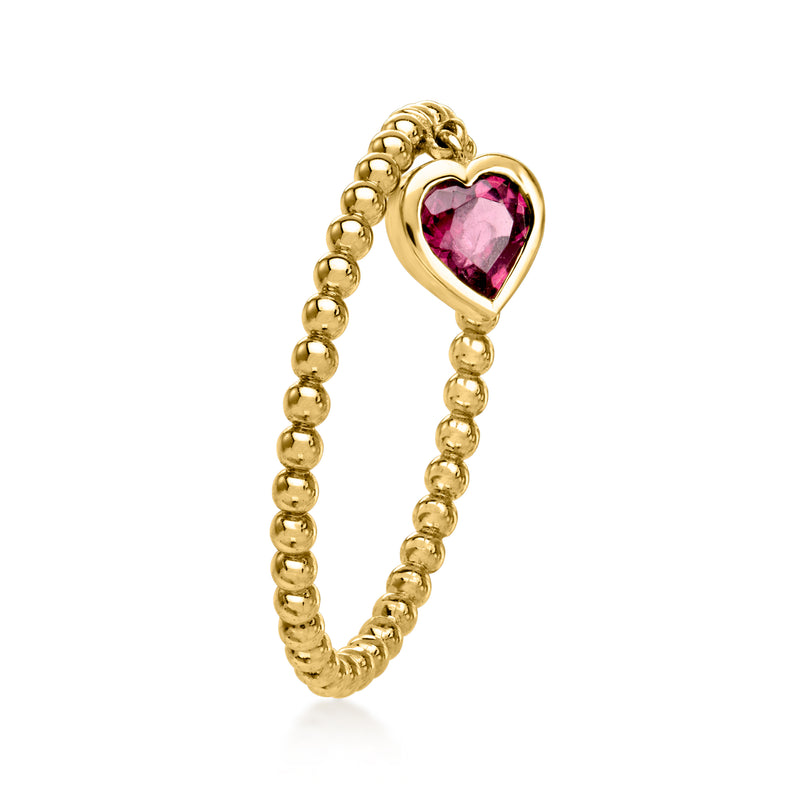 10kt yellow gold heart charm ring with pink gemstone bezel, side view