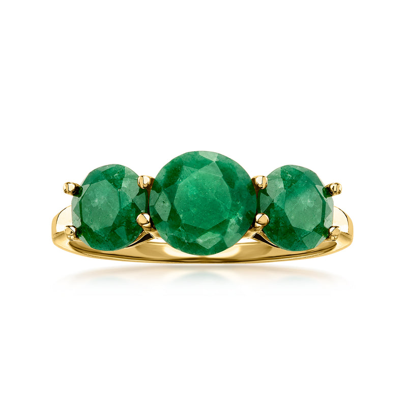 Three-stone emerald-cut green gemstone ring in gold-tone prong setting