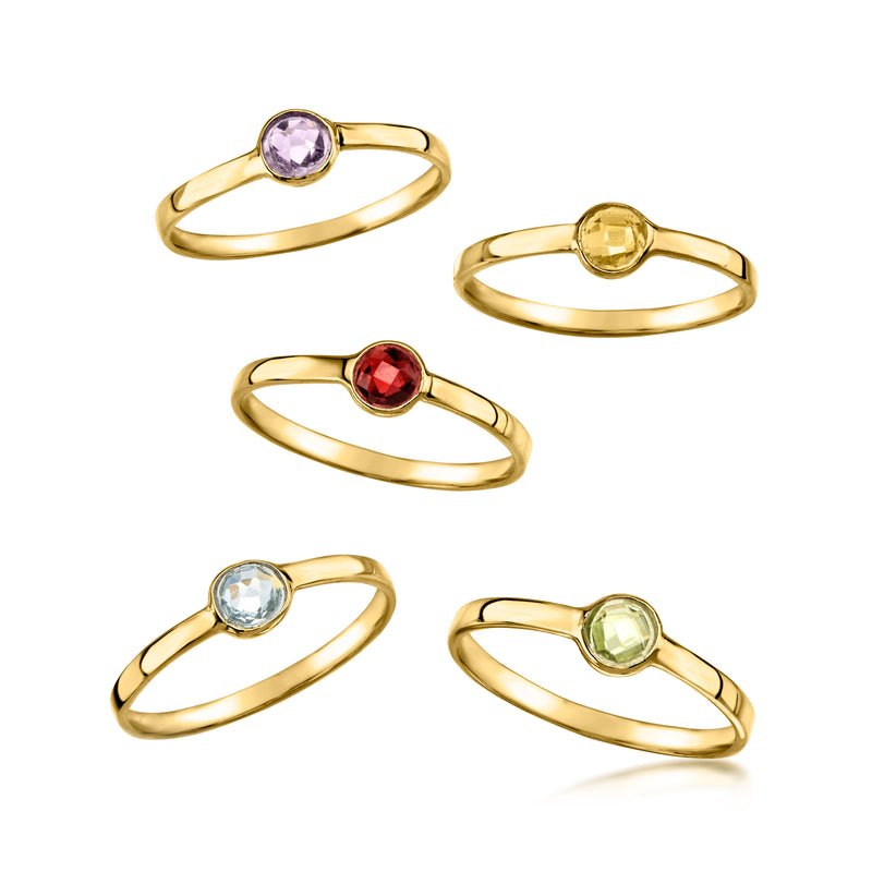 Set of five gold-tone gemstone rings: purple, yellow, red, light blue, and green