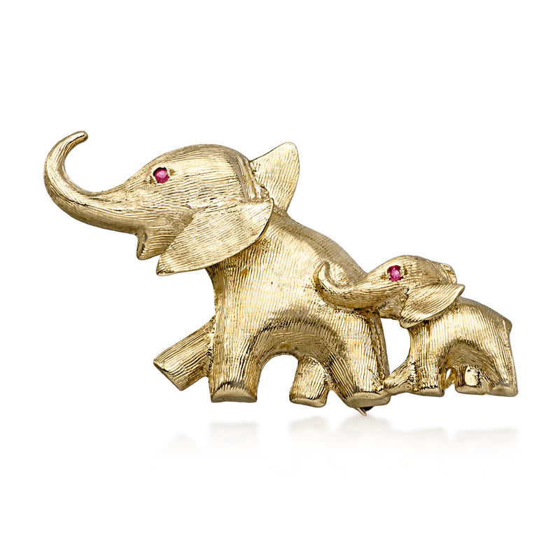 Vintage 14kt yellow gold elephant pin with red gemstone eyes