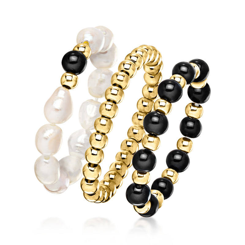 Three beaded stretch rings with white pearls and black onyx beads, gold-tone bead settings