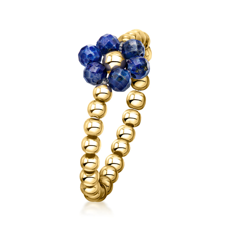 Blue lapis bead flower ring on 14kt yellow gold coiled stretch band, side view