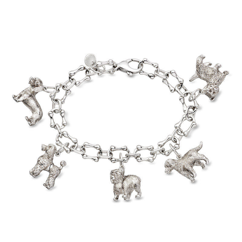Sterling silver dog charm bracelet with five dog figures, chain links, 7.5 in