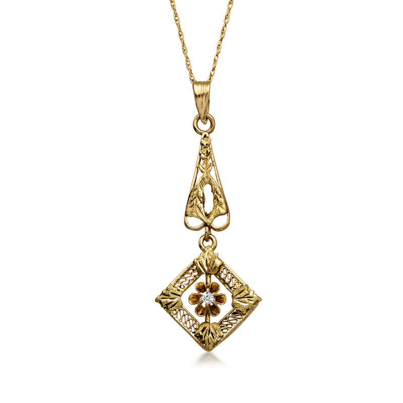 14kt yellow gold pendant necklace with single diamond and diamond-shaped charm