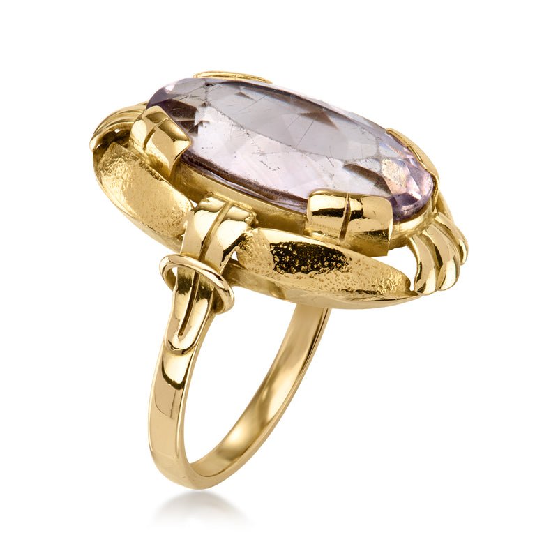 14kt yellow gold oval gemstone ring, side view with prong setting