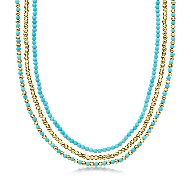 Three-layer turquoise bead necklace set with gold-tone beads and chain links