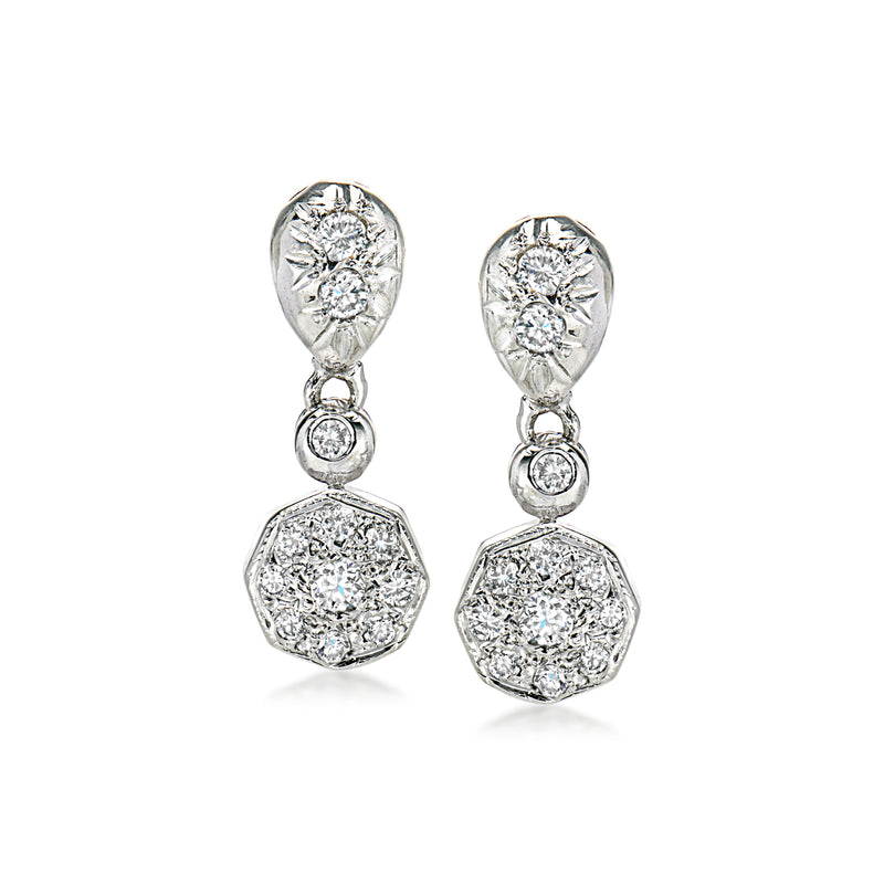 Vintage diamond drop earrings in 14kt white gold, oval and round studs with hanging drops