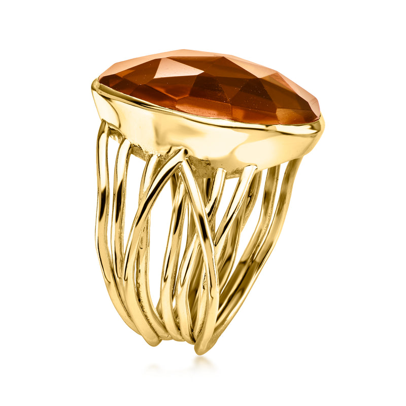 Yellow gold-plated ring with oval brown faceted gemstone and open-work band
