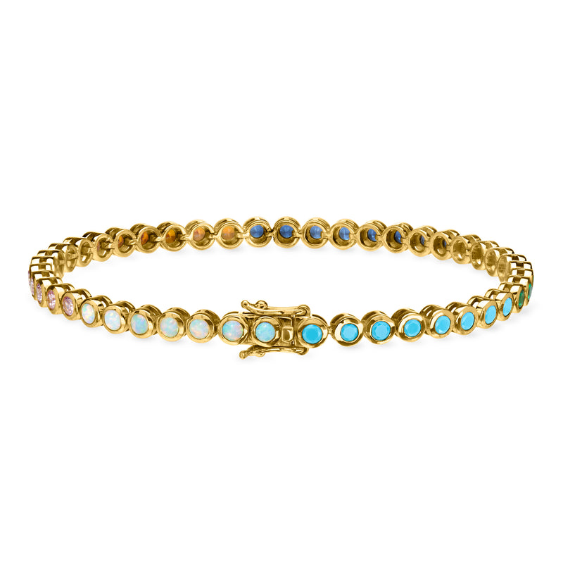 Gold-plated tennis bracelet with blue and turquoise simulated gemstones, center clasp