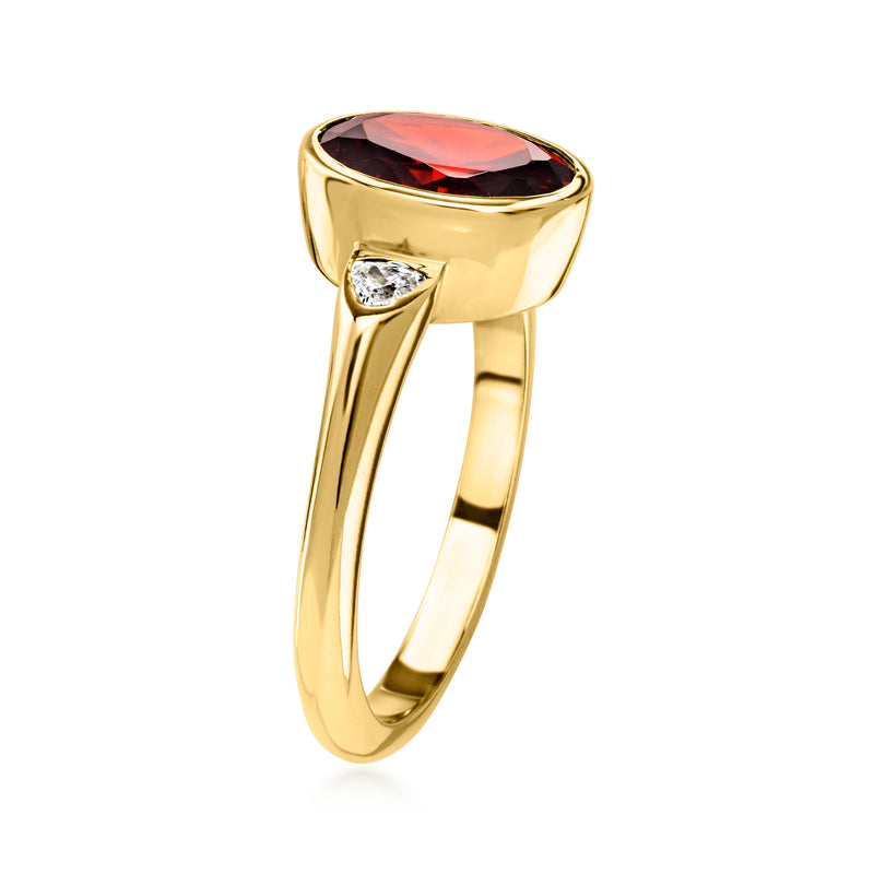 Gold-plated solitaire ring with red oval gemstone and small side CZ, open shank
