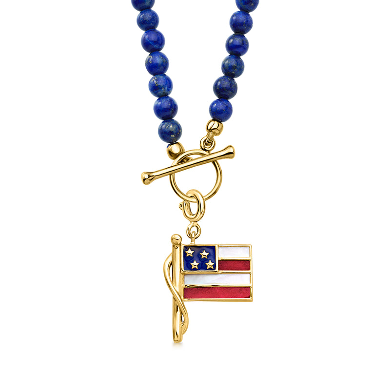 Gold American flag charm with blue star and red stripe enamel, dangling from loop