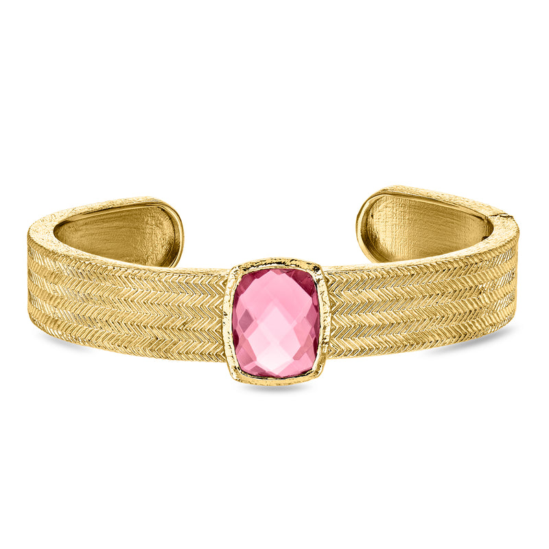 14kt yellow gold-plated cuff bracelet with textured band and pink faceted stone center