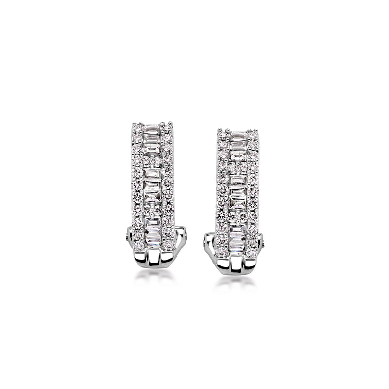 Curved diamond hoop earrings in 14k white gold with rectangular baguette stones