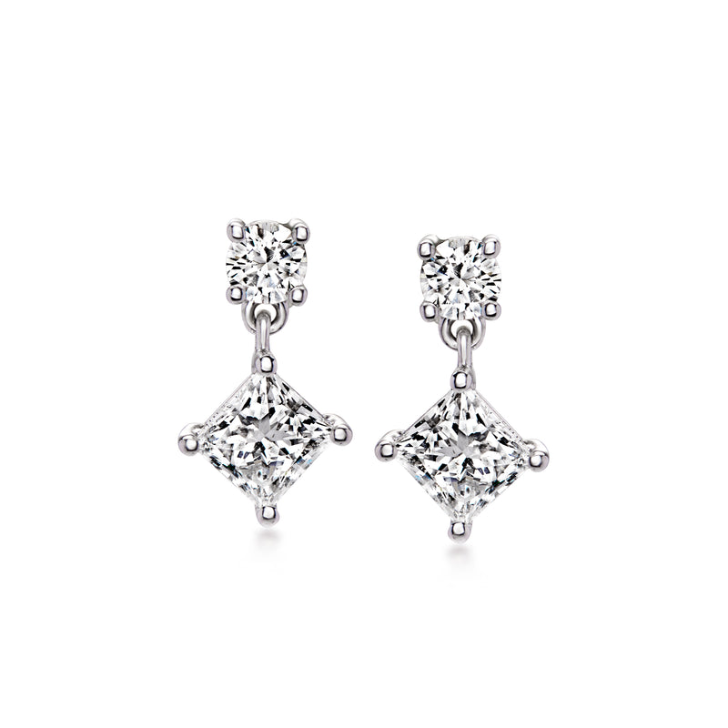 White gold diamond drop earrings with cluster top and cushion-cut dangle stones