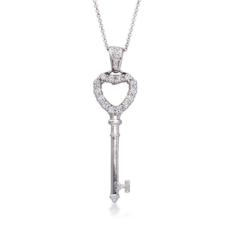 White gold key pendant necklace with heart-shaped diamond accents