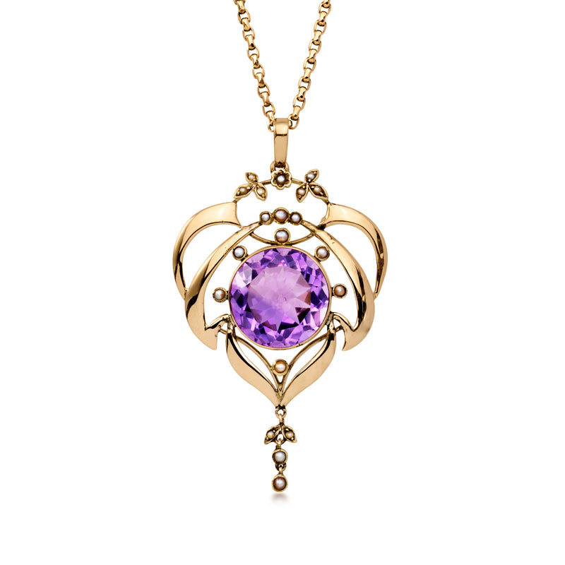 Vintage yellow gold pendant necklace with amethyst center and seed pearl accents.
